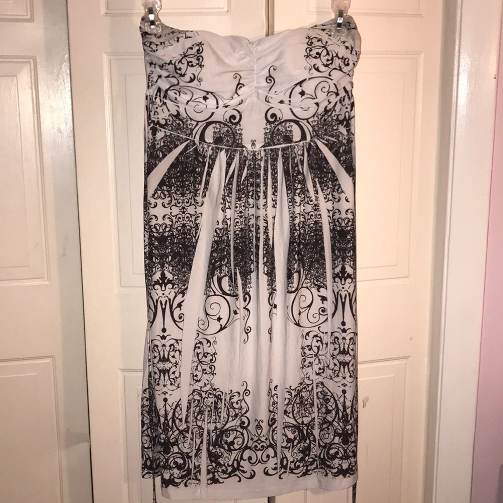 Black and white strapless mini dress.